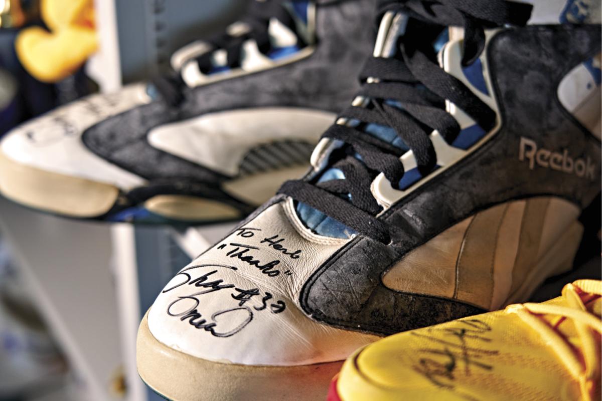 SHAQ’S SHOES A 1993 Shaquille O’Neal dunk brought down the basket near Turetzky’s son, David, who was a ball boy. Shaq’s advice the following year: “Stay away from falling baskets.”